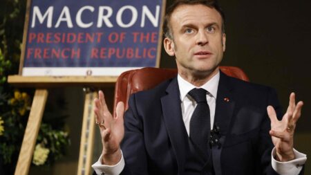 Macron takes swipe at Trump with ‘plug, baby, plug’ comment at AI summit – as it happened