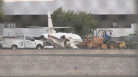 Moment Motley Crue singer’s plane crashes into jet on runway killing pilot and injuring the rocker’s girlfriend