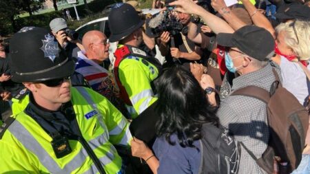 Anti-racism protesters protect Crawley hotel as delighted child waves from window – The Mirror