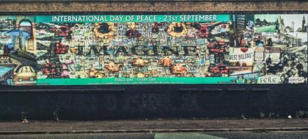 About 15,000 join Belfast anti-racism rally as trouble flares in Derry – The Guardian