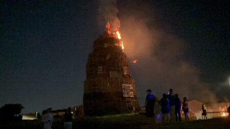 Stormont minister criticises bonfire at asbestos site as Kneecap effigies and Irish language signage destroyed – Belfast Telegraph