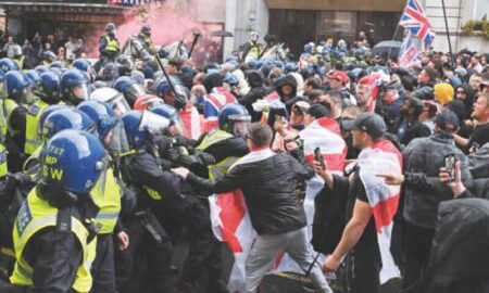 Protesters clash with counter group at anti-immigration march – BBC