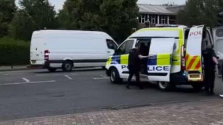 Boy, 16, arrested after pair stabbed at Wigan bus station – BBC
