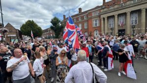Derby councillor reports rape threat after flag removal decision – BBC
